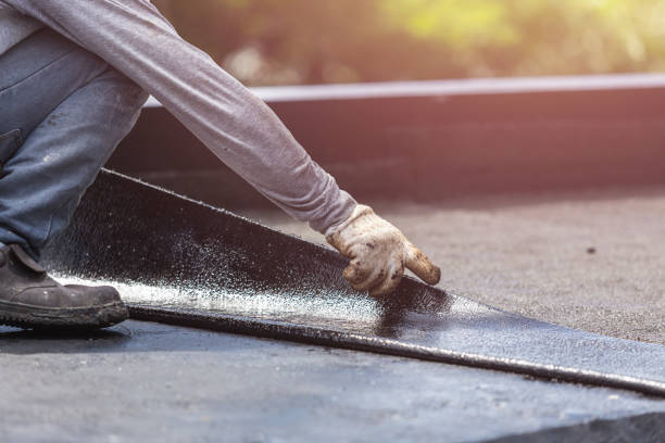 Professional Exterior Waterproofing technician working in Lyons, MI
